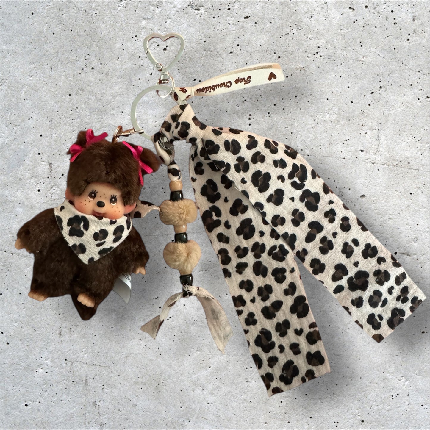 Grigri Monchhichi / Kiki – Léopard Gaze de Coton | Mousqueton cœur