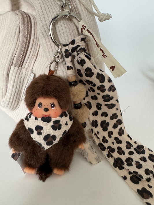 Grigri Monchhichi / Kiki – Léopard Gaze de Coton | Mousqueton cœur